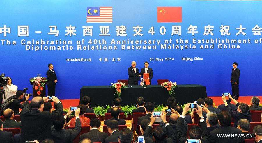 الصين وماليزيا تحتفلان بالذكرى الأربعين لإقامة العلاقات الدبلوماسية