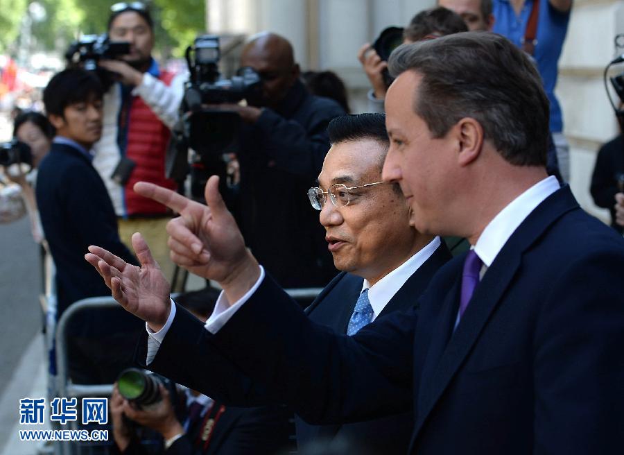 رئيس مجلس الدولة الصيني يقترح زيادة التجارة بين الصين وبريطانيا إلى100 مليار دولار فى 2015