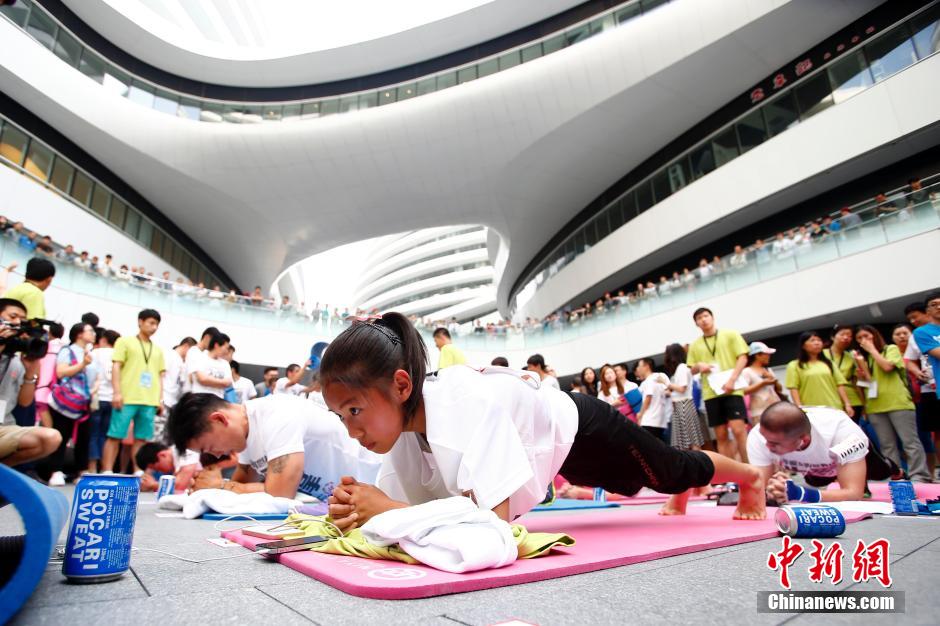 بكين تسجل رقما قياسيا عالميا من حيث عدد المشاركين فى تمارين الضغط   