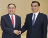 رئيس مجلس الدولة الصيني يدعو الصين وجمهورية كوريا لتسريع مفاوضات اتفاقية التجارة الحرة
