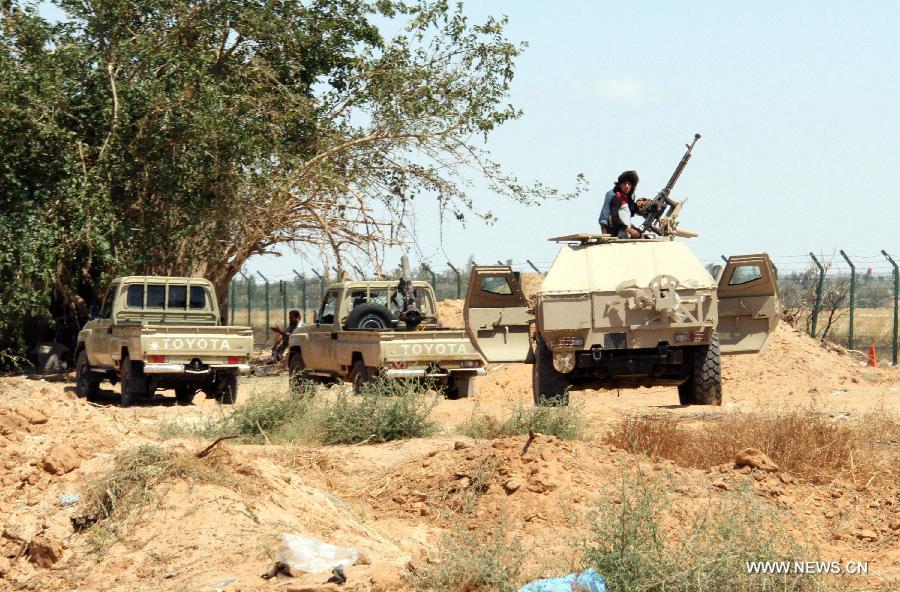 قوات درع ليبيا تدرس التدخل لفض النزاع في مطار طرابلس الدولي
