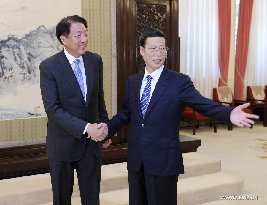 نائب رئيس مجلس الدولة الصينى يجتمع مع نائب رئيس وزراء سنغافورة