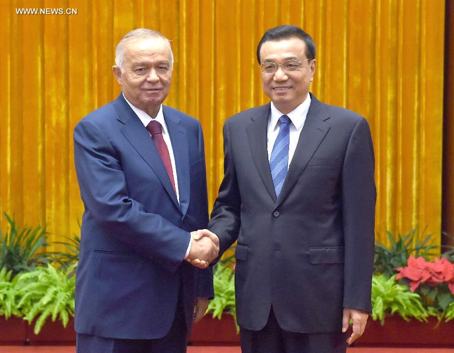الصين واوزبكستان تتعهدان بزيادة التعاون فى مجال البنية الاساسية والطاقة
