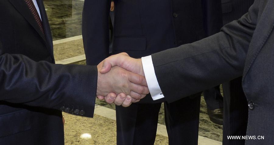 بوتين وبوروشينكو يعقدان أول اجتماع ثنائي فى مينسك