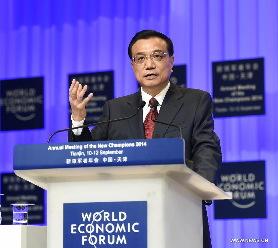 رئيس مجلس الدولة الصيني يعرب عن ثقته في تحقيق أهداف الاقتصاد خلال عام 2014