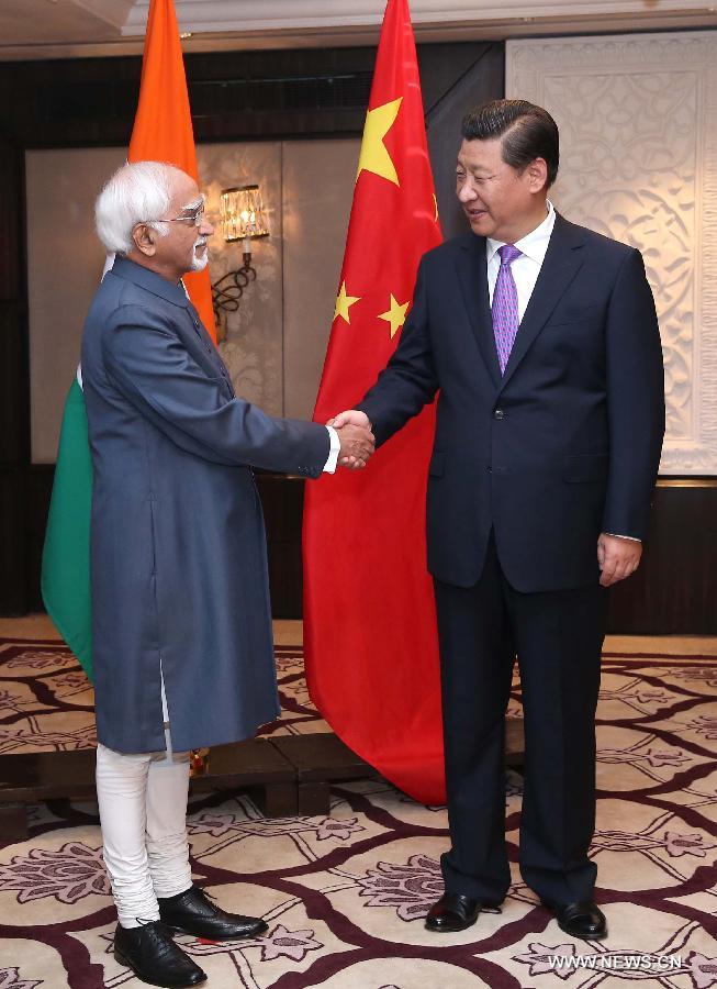 الرئيس الصيني يلتقي بنائب الرئيس الهندي