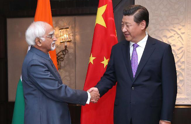 الرئيس الصيني يلتقي بنائب الرئيس الهندي