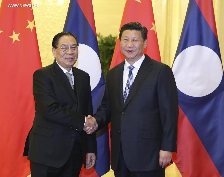 الصين ولاوس تتعهدان بتعزيز التعاون والاتصالات
