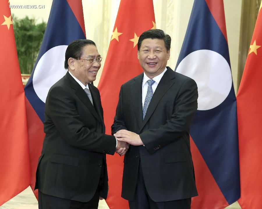الصين ولاوس تتعهدان بتعزيز التعاون والاتصالات
