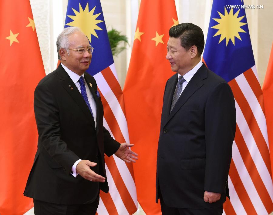 الصين وماليزيا تعززان التعاون الثنائي
