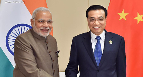 رئيس مجلس الدولة الصيني يتعهد بتعزيز التعاون مع الهند