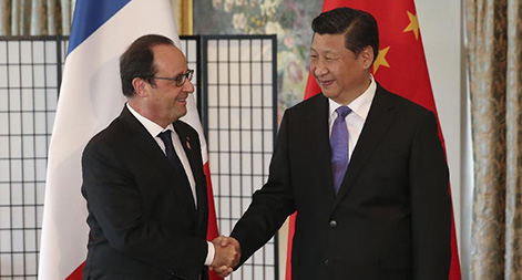 رئيسا الصين وفرنسا يوافقان على دفع شراكة استراتيجية شاملة
