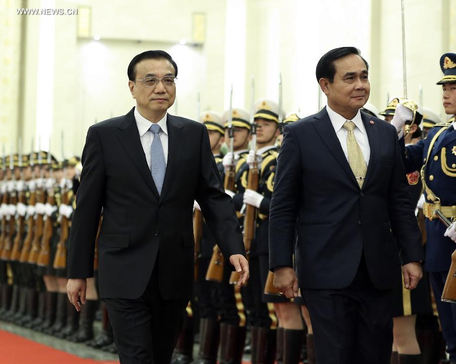 الصين وتايلاند تتعهدان بتعزيز العلاقات بينهما