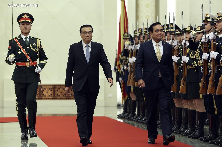 الصين وتايلاند تتعهدان بتعزيز العلاقات بينهما
