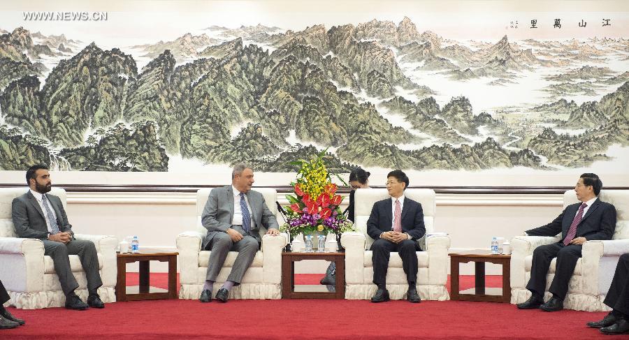 الصين وأفغانستان تتعهدان بتعزيز التعاون الأمني