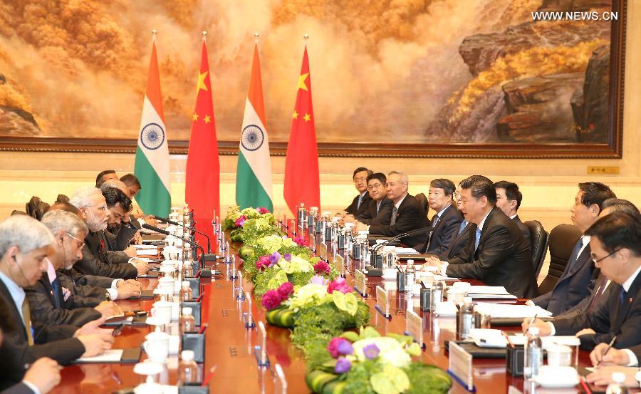 الرئيس الصيني يلتقى برئيس وزراء الهند