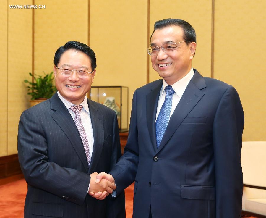 رئيس مجلس الدولة الصيني يجتمع مع مدير عام منظمة التنمية الصناعية