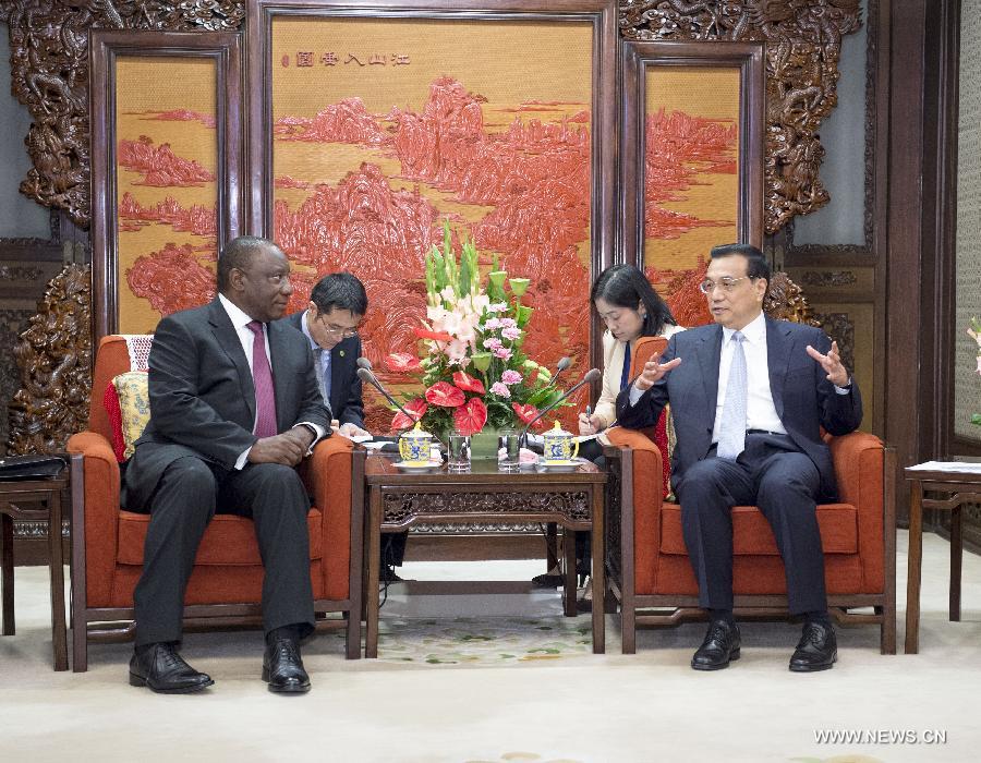 رئيس مجلس الدولة الصينى يجتمع مع نائب رئيس جنوب افريقيا