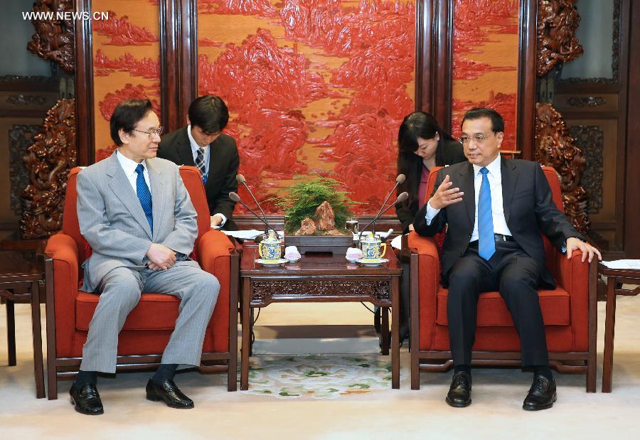 رئيس مجلس الدولة الصيني يجتمع مع مستشار الأمن الوطنى اليابانى