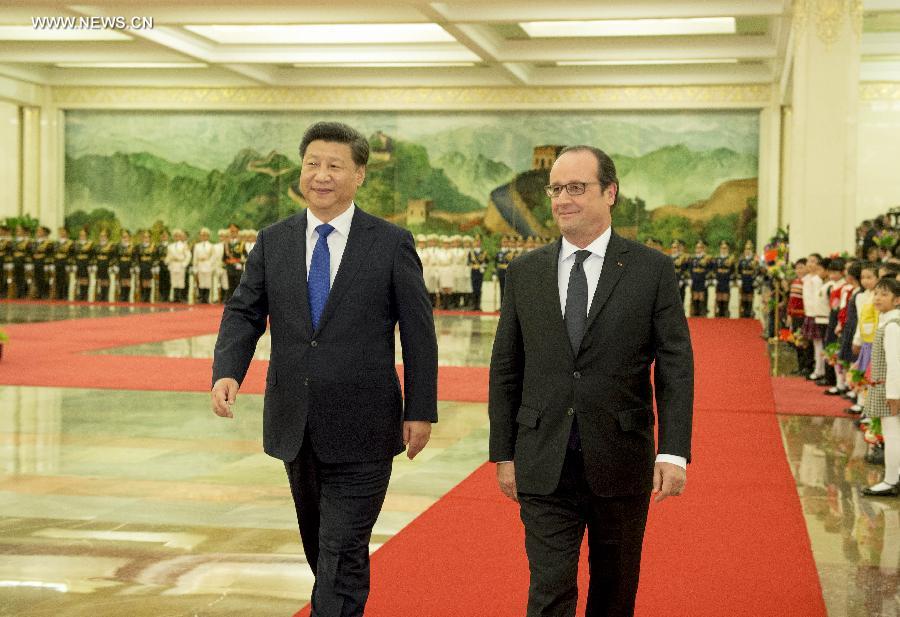 الرئيسان الصيني والفرنسي يتوصلان إلى توافق بشأن تغير المناخ