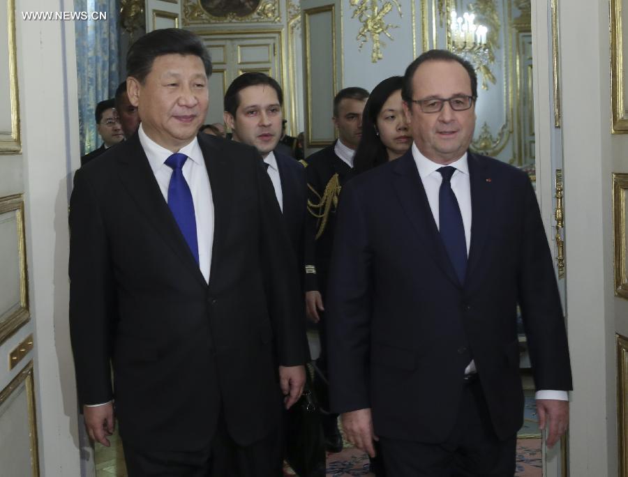 الصين وفرنسا تتعهدان بالعمل معا لإنجاح قمة باريس حول المناخ