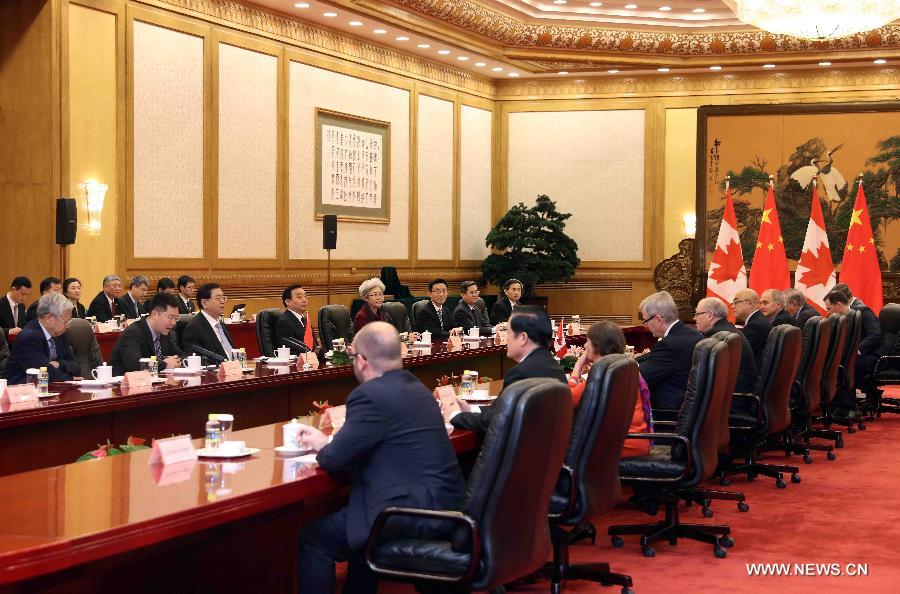 الصين وكندا تتعهدان بتعزيز التبادلات البرلمانية