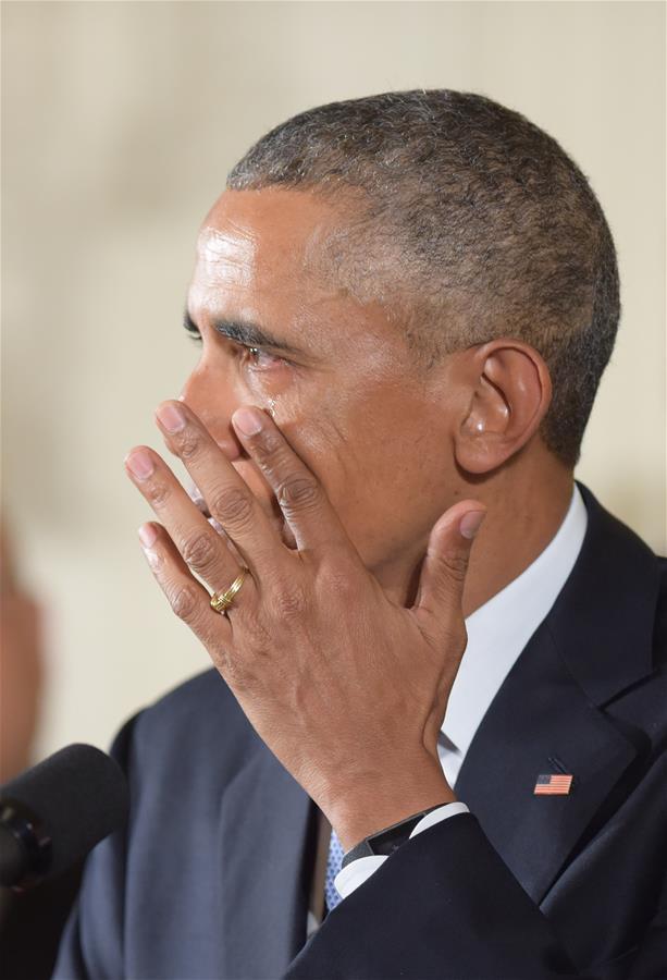  رئيس الولايات المتحدة اوباما يبكي في المؤتمر الصحفي عن تقييد حمل الأسلحة في البلاد (شينخوا / باو دان دان)
