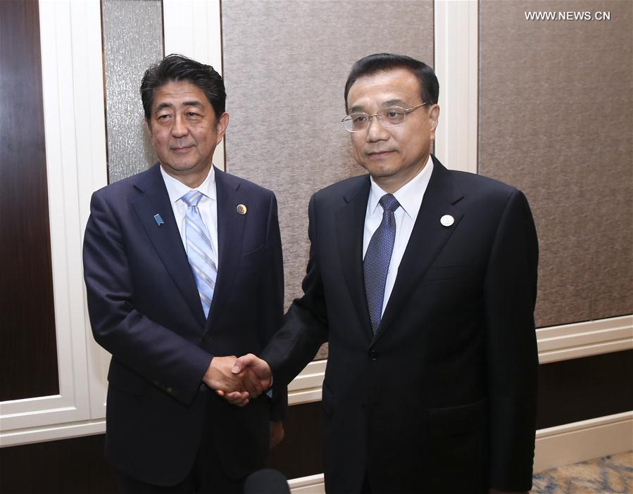 رئيس مجلس الدولة الصيني يطالب اليابان بعدم التدخل في قضية بحر الصين الجنوبي