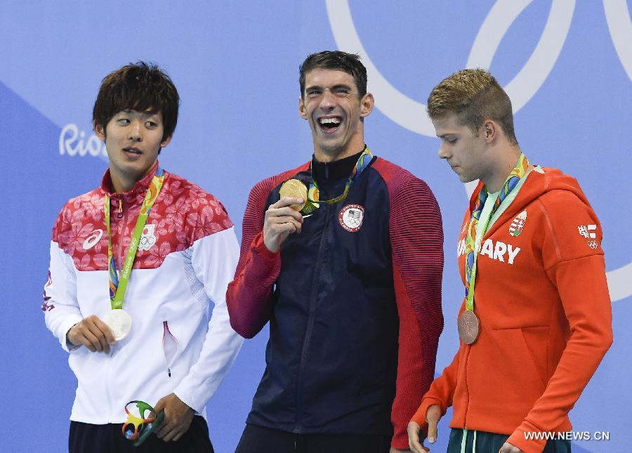 مايكل فيلبس يضيف ذهبيتين إلى حصيلته من الميداليات الأولمبية