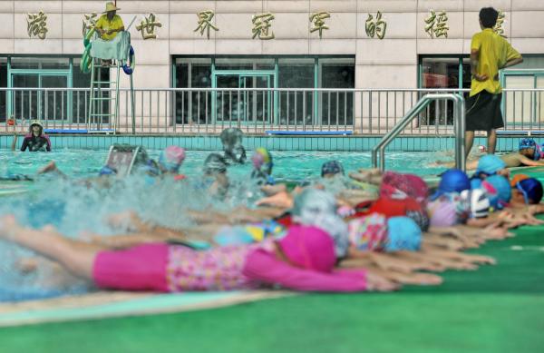  13 بطل عالمي مرّوا بمدرسة تشن جينغ لون الرياضية في هانغتشو