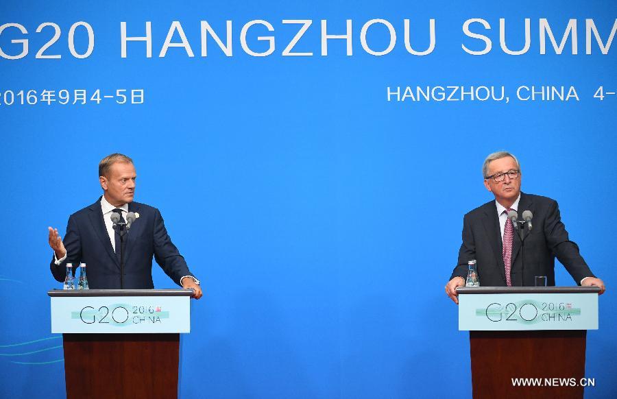 تقرير اخباري: توسك ويونكر: قمة هانغتشو فرصة لانعاش الاقتصاد العالمي