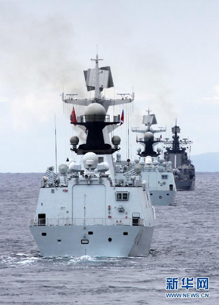 قوات بحرية من الصين وروسيا تنفذ مناورة بحرية في بحر الصين الجنوبي 