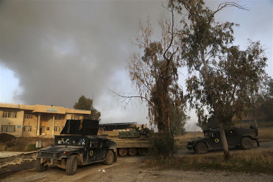 القوات العراقية تستعيد حيين وقرية شرقي الموصل