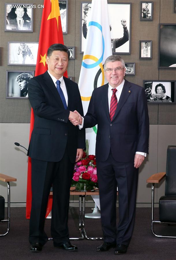 الرئيس الصينى يجتمع مع رئيس اللجنة الاولمبية الدولية ويتعهد بجعل الدورة الأولمبية الشتوية لعام 2022 حدثا ممتازا