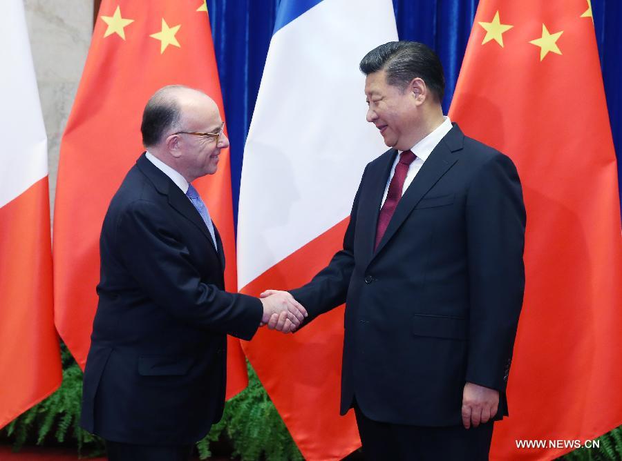 الصين وفرنسا تتفقان على تعزيز العلاقات الثنائية