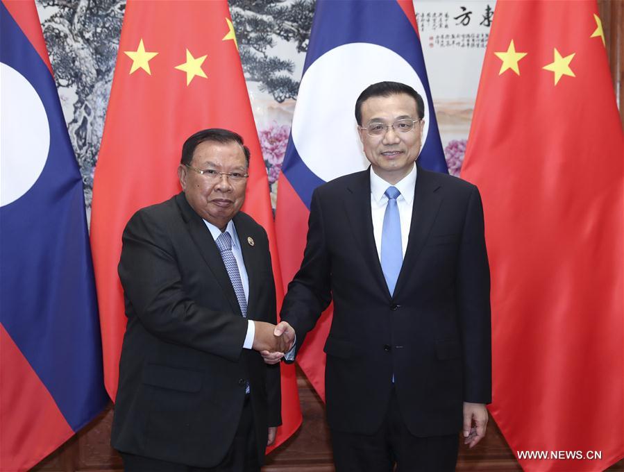 رئيس مجلس الدولة الصيني يلتقي رئيس لاوس لبحث التعاون
