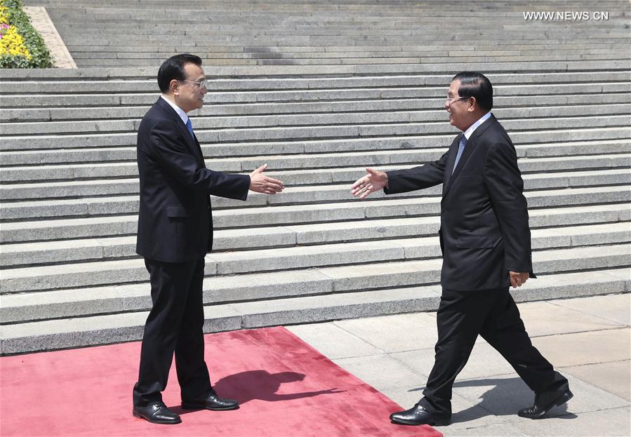 الصين وكمبوديا تتعهدان بتحسين التعاون وتعزيز الاستقرار الإقليمي