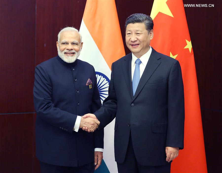 الرئيس شى يقول إنه يتعين التركيز على التعاون بين الصين والهند