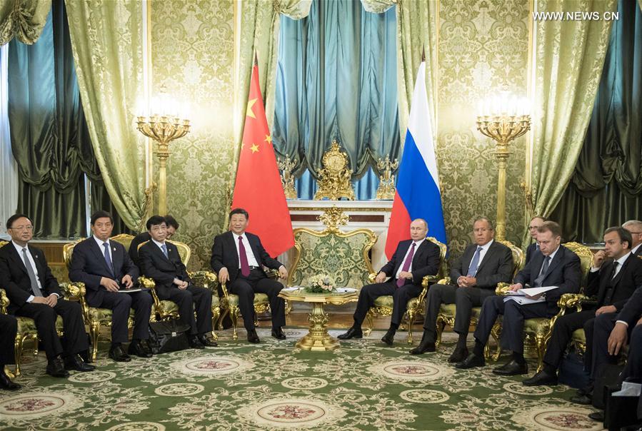 الصين وروسيا تتعهدان بالقيام بدور حجر التوازن فى السلم العالمى