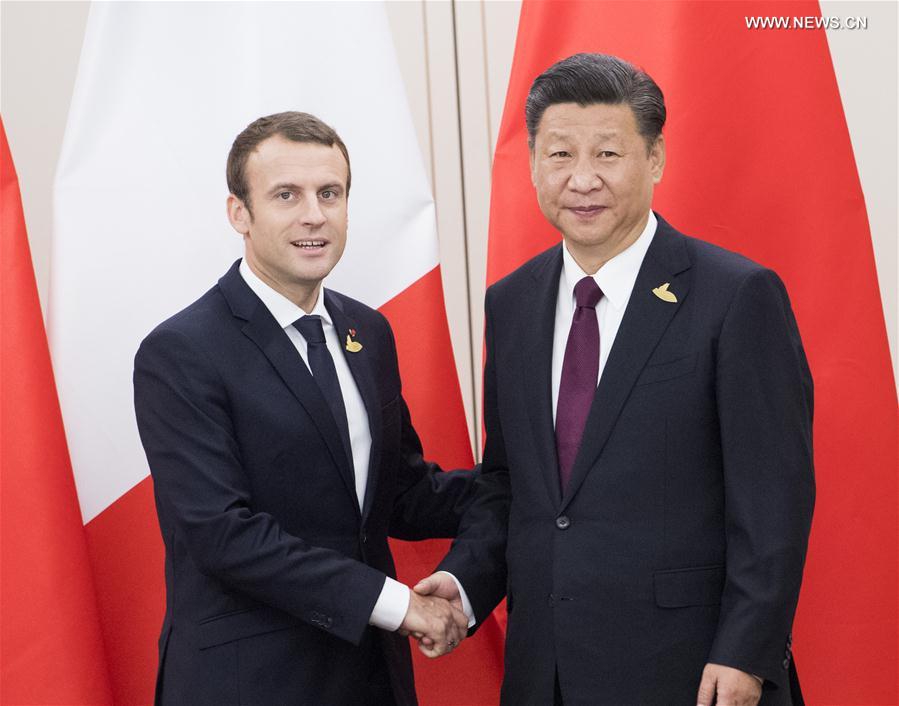شي وماكرون يتفقان على تعزيز التعاون الصيني - الفرنسي