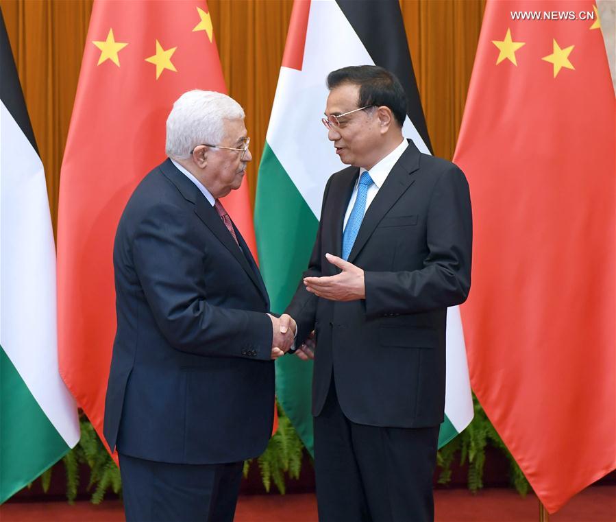 الصين تعزز التعاون مع فلسطين فى مجالات التجارة والبنية الأساسية