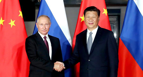 الرئيس الصيني يلتقي ببوتين ويدعو إلى تعزيز السلام والتنمية العالمية