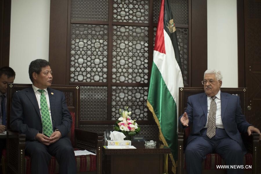 عباس يؤكد حرص القيادة الفلسطينية على تمتين كافة العلاقات مع الصين