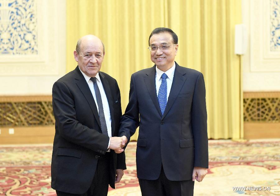 الصين وفرنسا تتعهدان بتعزيز التعاون في مجالي الطاقة النووية والتغير المناخي