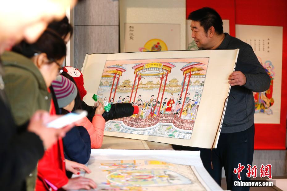 الصينيون يستقبلون عيد الربيع وسط شراء واسع النطاق لرسومات السنة الجديدة
