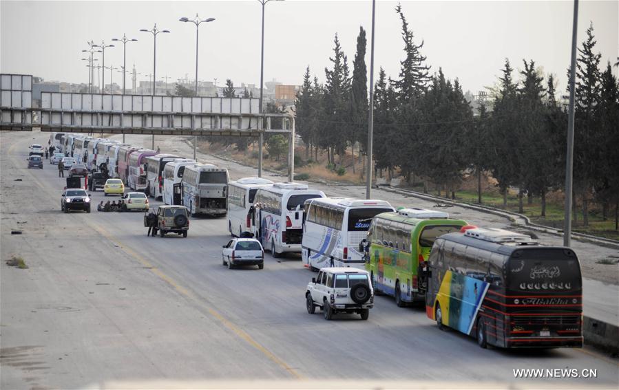 تقرير إخباري : الفا شخص سيغادرون مدينة حرستا بريف دمشق كدفعة أولى