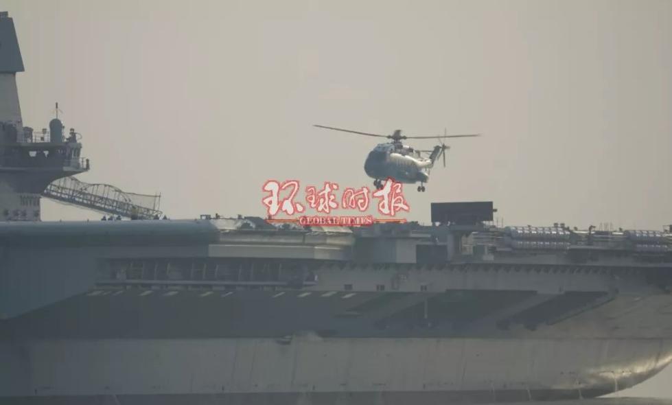 أول إقلاع وهبوط لطائرة الهليكوبتر على حاملة الطائرات المصنعة صينيا