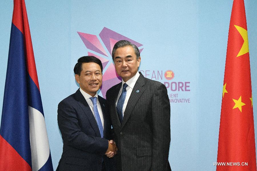 وزير الخارجية الصيني يلتقي وزير خارجية لاوس لتعزيز العلاقات الثنائية