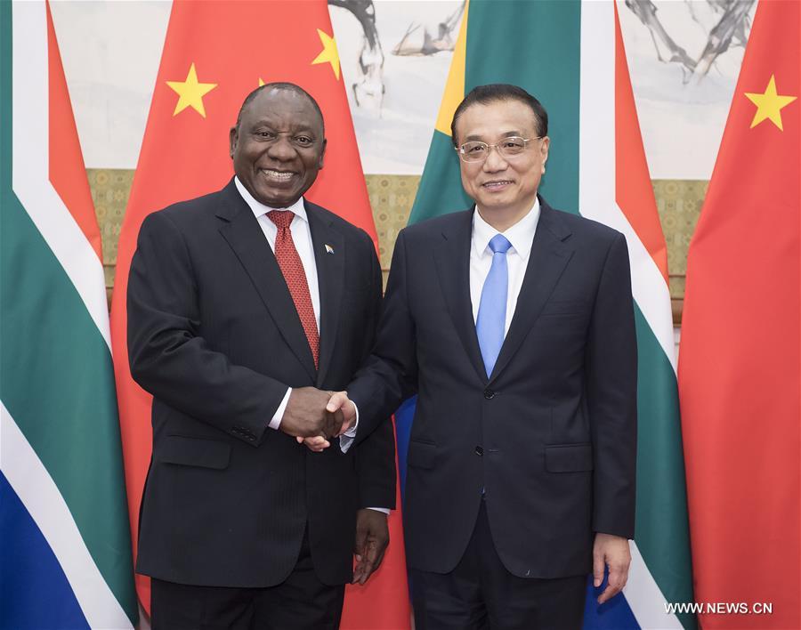 رئيس مجلس الدولة الصيني يلتقي رئيس جنوب أفريقيا