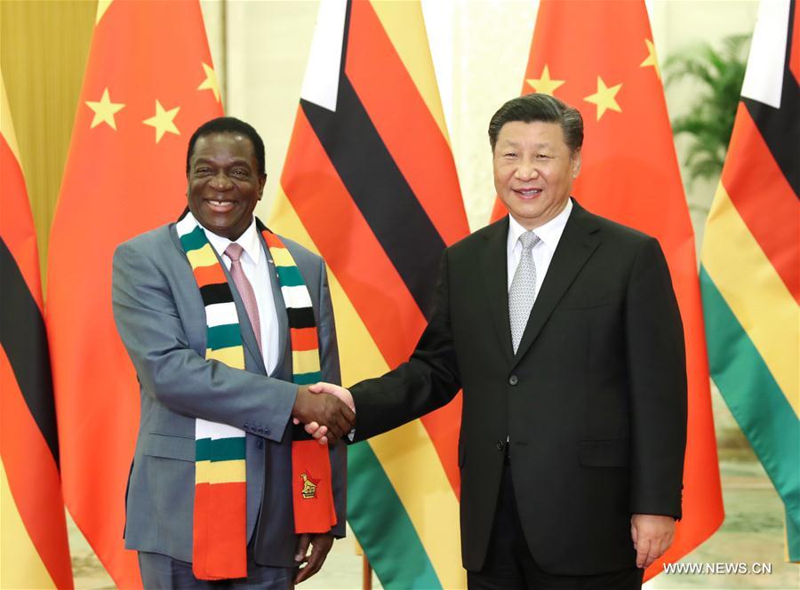 شي يلتقي رئيس زيمبابوي